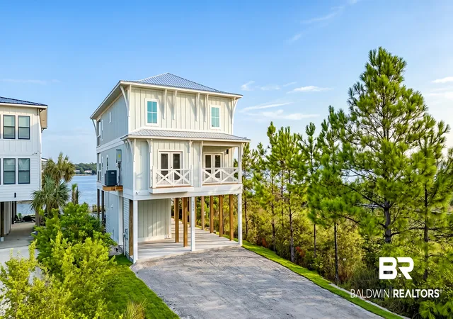 Photo 2 of Single family home for sale at 1360 W Lagoon Ave, Gulf Shores, AL 36542 | MLS# 410097 | Listing updated on 2026-09-18