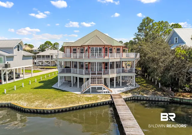 Photo 1 of Single family home for sale at 406 Minnow Ln, Gulf Shores, AL 36542 | MLS# 411036 | Listing updated on 2026-09-25