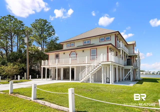 Photo 2 of Single family home for sale at 406 Minnow Ln, Gulf Shores, AL 36542 | MLS# 411036 | Listing updated on 2026-09-25
