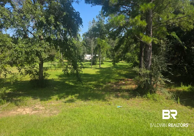 Photo 2 of Land for sale at 22003 County Rd 68 N, Robertsdale, AL 36567 | MLS# 409296 | Listing updated on 2026-10-06