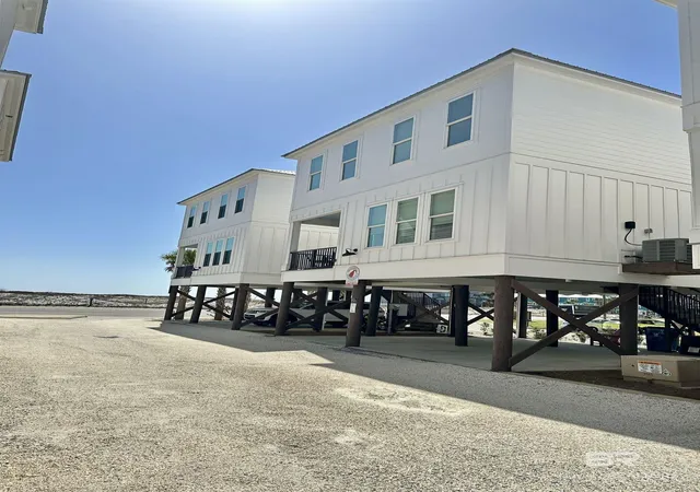 Photo 1 of Single family home for sale at 588 E Beach Ave #B, Gulf Shores, AL 36542 | MLS# 411708 | Listing updated on 2026-10-07