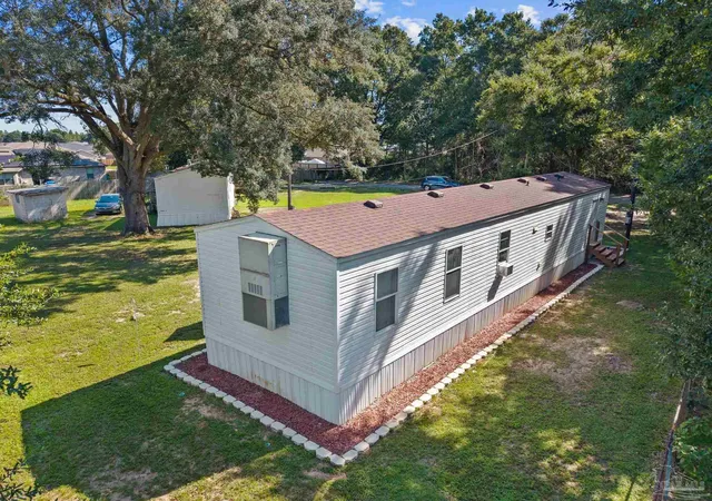Photo 2 of Manufactured home for sale at 6993 Datura St, Milton, FL 32570 | MLS# 688475 | Listing updated on 2026-09-14