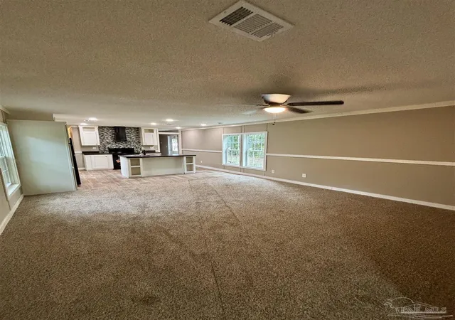Photo 3 of Manufactured home for sale at 6923 Datura St, Milton, FL 32570 | MLS# 689521 | Listing updated on 2026-09-25