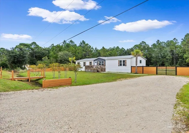 Photo 2 of Manufactured home for sale at 1920 Mercy Ln, Milton, FL 32583 | MLS# 688656 | Listing updated on 2026-09-13