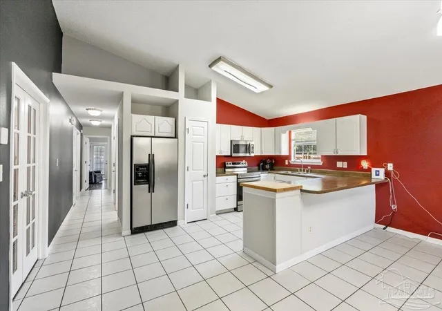 Photo 3 of Single family home for sale at 7057 Weatherwood Dr, Pensacola, FL 32506 | MLS# 689830 | Listing updated on 2026-10-02