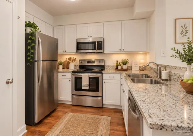 Listing Photo 2 - Condo for sale in building located at 5001 Grande Dr, Pensacola, FL 32504 - Unit #122