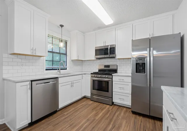Photo 3 of Single family home for sale at 7663 Old Hickory Dr, Pensacola, FL 32507 | MLS# 688568 | Listing updated on 2026-09-25