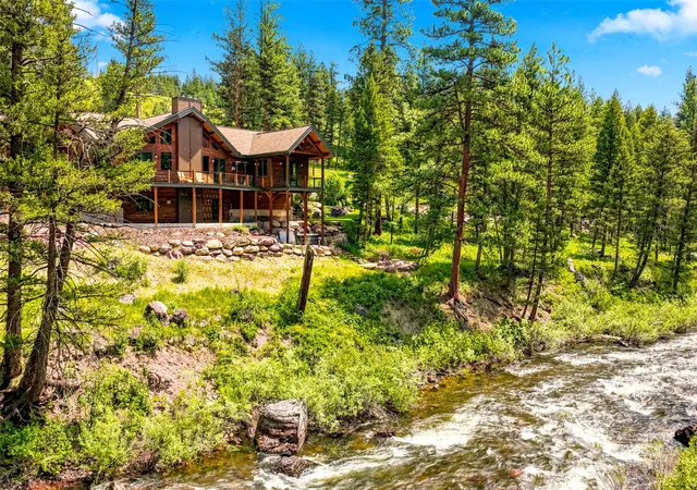 Photo 1 of Single family home for sale at 1923 & 1933 River Watch Trl, Seeley Lake, MT 59868 | MLS# 30073063 | Listing updated on 2026-09-02