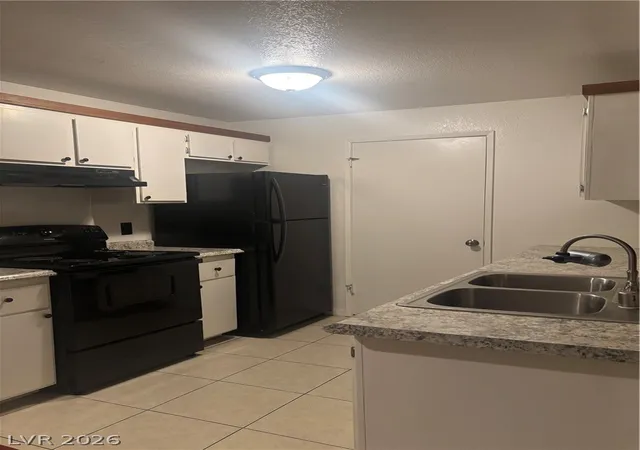Listing Photo 1 - Condo for sale in building located at 220 Mission Newport Ln, Las Vegas, NV 89107 - Unit #201