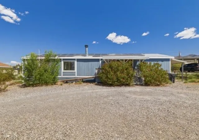 Photo 2 of Manufactured home for sale at 820 E Fort Carson Rd, Pahrump, NV 89060 | MLS# 2778446 | Listing updated on 2026-09-23
