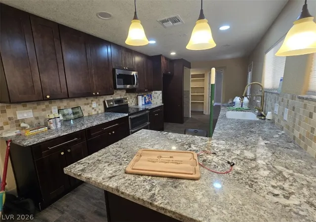Photo 3 of Single family home for sale at 5785 W Russell Rd, Las Vegas, NV 89118 | MLS# 2793466 | Listing updated on 2026-09-28