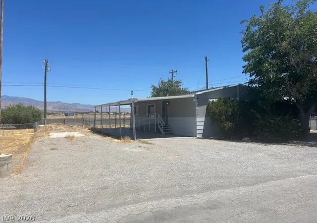 Photo 1 of Manufactured home for sale at 1061 S Comstock Cir, Pahrump, NV 89048 | MLS# 2794974 | Listing updated on 2026-09-03