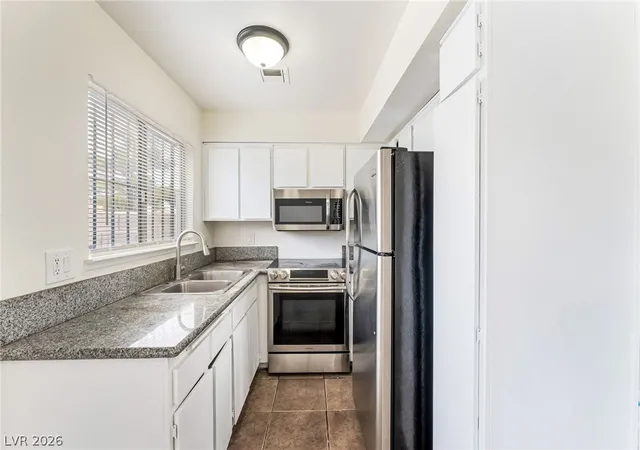 Photo 3 of Townhouse for sale at 3361 Civic Ctr Dr #F, North Las Vegas, NV 89030 | MLS# 2800475 | Listing updated on 2026-09-01