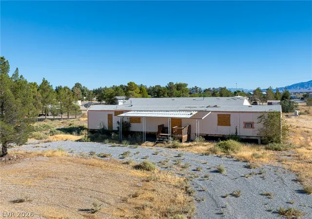 Photo 3 of Manufactured home for sale at 1611 W Irons St, Pahrump, NV 89048 | MLS# 2814133 | Listing updated on 2026-09-04