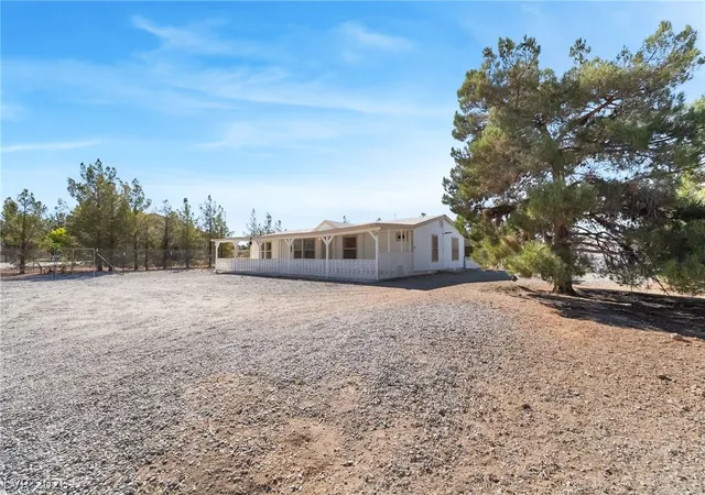 Photo 3 of Manufactured home for sale at 1551 W Wilson Rd, Pahrump, NV 89048 | MLS# 2815763 | Listing updated on 2026-09-04