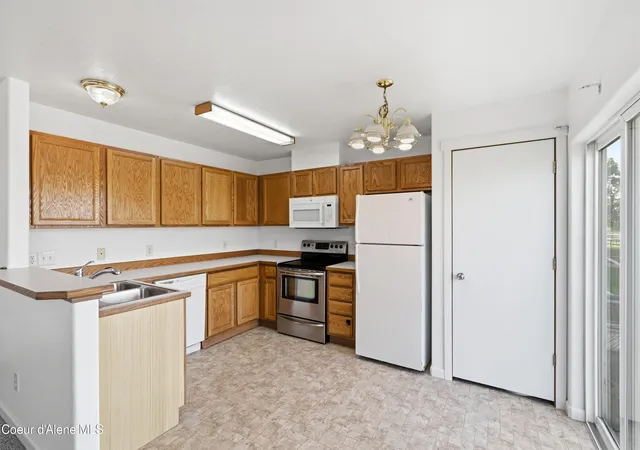 Photo 3 of Multi family home for sale at 1613 E Coeur D Alene Ave A & B, Post Falls, ID 83854 | MLS# 26-9316 | Listing updated on 2026-09-11