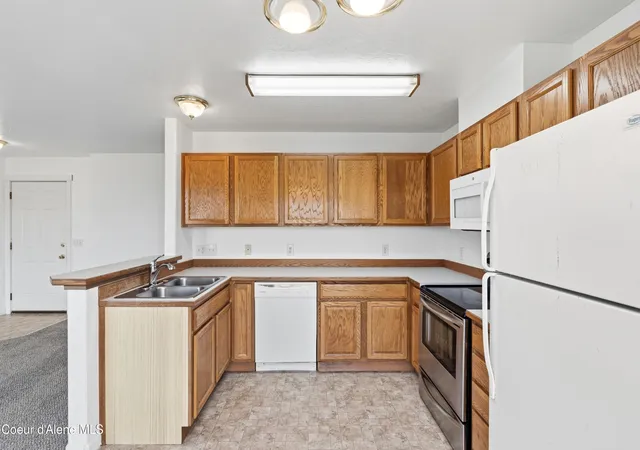 Photo 4 of Multi family home for sale at 1613 E Coeur D Alene Ave A & B, Post Falls, ID 83854 | MLS# 26-9316 | Listing updated on 2026-09-11