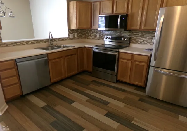 Photo 3 of Condo for sale at 7034 Forrester Ln, Indianapolis, IN 46217 | MLS# 22096654 | Listing updated on 2026-10-19