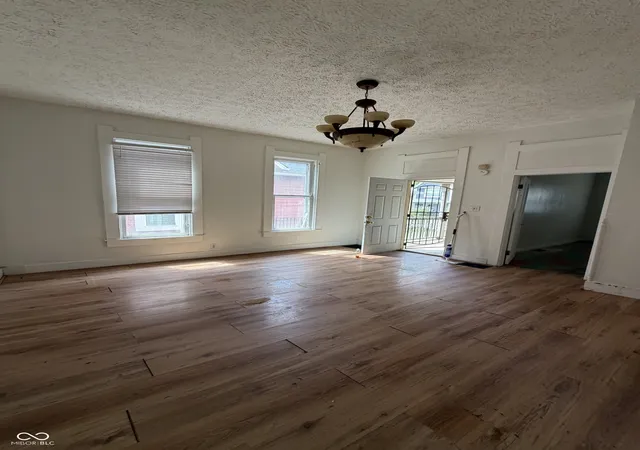 Photo 2 of Single family home for sale at 231 N Summit St, Indianapolis, IN 46201 | MLS# 22118567 | Listing updated on 2026-09-03