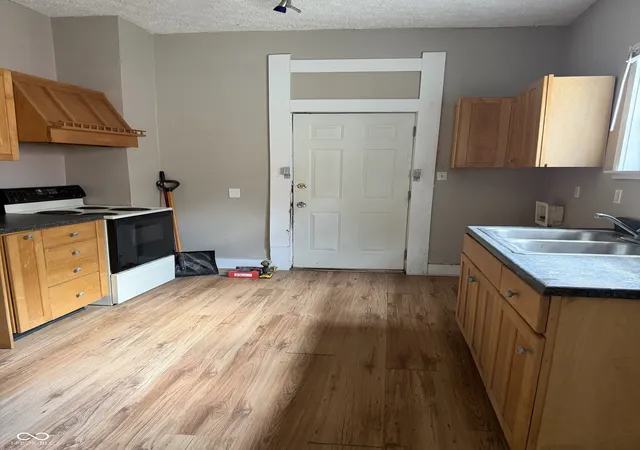 Photo 2 of Single family home for sale at 231 N Summit St, Indianapolis, IN 46201 | MLS# 22118567 | Listing updated on 2026-09-03