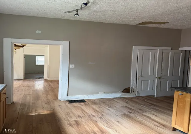 Photo 3 of Single family home for sale at 231 N Summit St, Indianapolis, IN 46201 | MLS# 22118567 | Listing updated on 2026-09-03