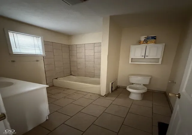 Photo 4 of Single family home for sale at 231 N Summit St, Indianapolis, IN 46201 | MLS# 22118567 | Listing updated on 2026-09-03