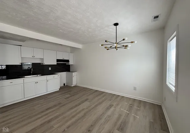 Photo 3 of Single family home for sale at 110 Wisconsin, Indianapolis, IN 46225 | MLS# 22121620 | Listing updated on 2026-09-21