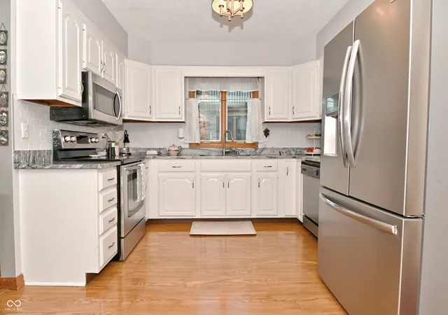 Photo 3 of Condo for sale at 8336 Chapel Pines Dr, Indianapolis, IN 46234 | MLS# 22124275 | Listing updated on 2026-09-04