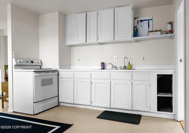 Photo 3 of Multi family home for sale at 3340 Tarwater Ave, Anchorage, AK 99508 | MLS# 26-9045 | Listing updated on 2026-09-30