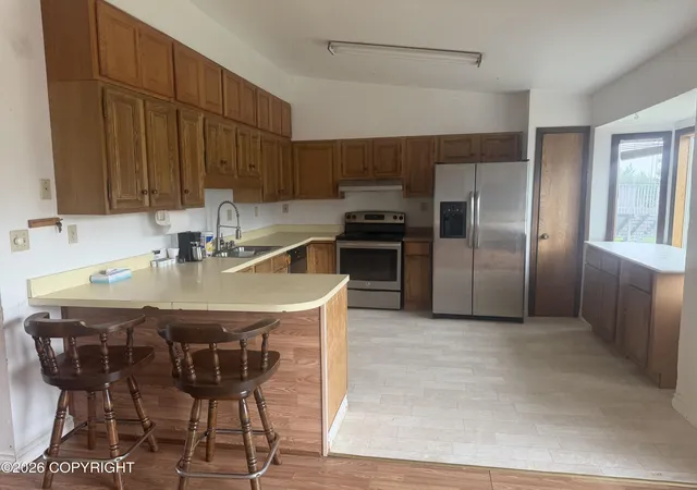 Photo 4 of Single family home for sale at 1841 Early View Dr, Anchorage, AK 99504 | MLS# 26-10940 | Listing updated on 2026-10-13