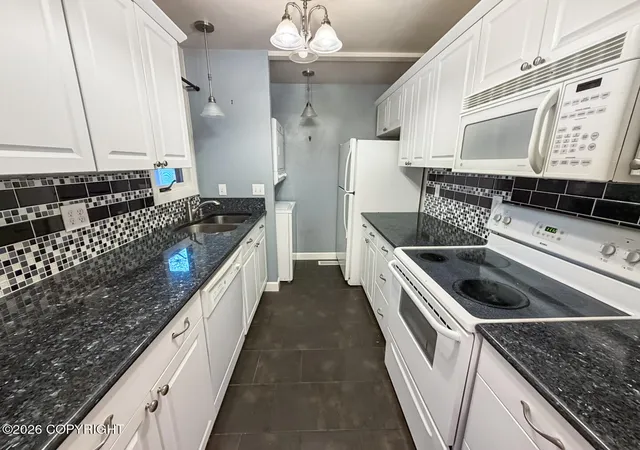Photo 1 of Condo for sale at 7351 Huntsmen Cir #18G, Anchorage, AK 99518 | MLS# 26-9734 | Listing updated on 2026-09-03