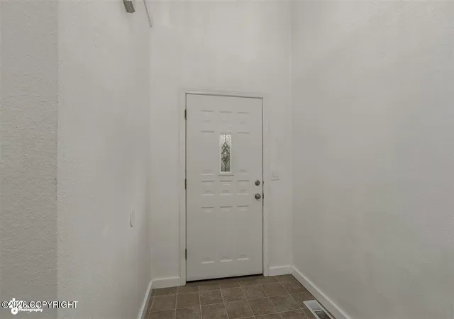 Photo 3 of Sale Pending at 8521 Brookway Cir, Anchorage, AK 99504 | MLS# 26-12222 | Listing updated on 2026-10-03