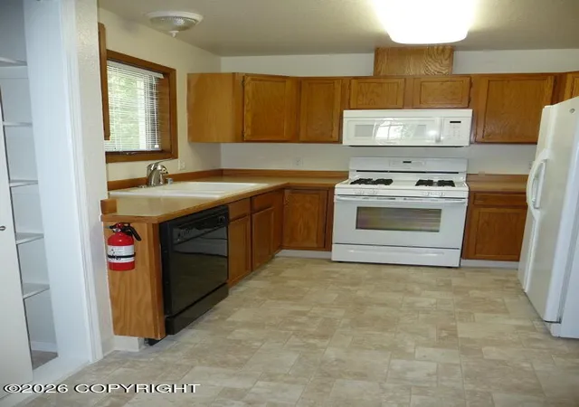 Photo 3 of Single family home for sale at 5401 E Pine St, Wasilla, AK 99654 | MLS# 26-12309 | Listing updated on 2026-09-24