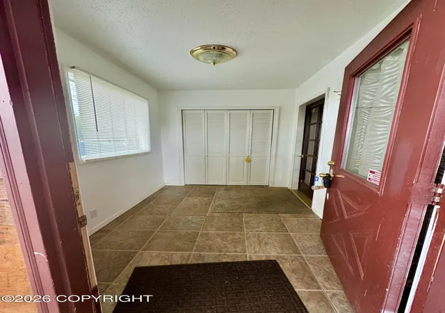 Photo 3 of Single family home for sale at 15407 Old Glenn Hwy, Eagle River, AK 99577 | MLS# 26-11284 | Listing updated on 2026-09-21