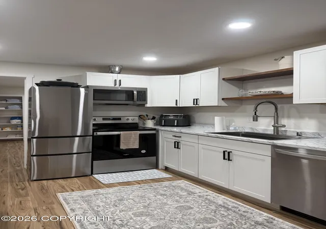 Photo 1 of Multi family home for sale at 1335 Wintergreen St, Anchorage, AK 99508 | MLS# 26-12563 | Listing updated on 2026-10-03