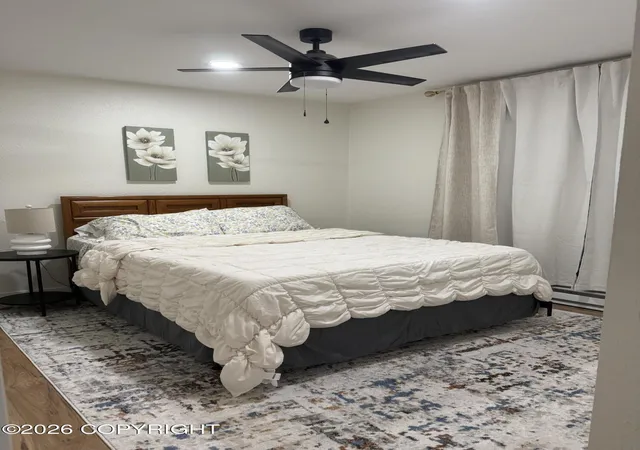 Photo 2 of Multi family home for sale at 1335 Wintergreen St, Anchorage, AK 99508 | MLS# 26-12563 | Listing updated on 2026-10-03