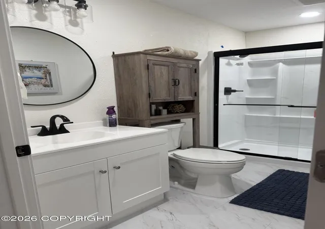 Photo 3 of Multi family home for sale at 1335 Wintergreen St, Anchorage, AK 99508 | MLS# 26-12563 | Listing updated on 2026-10-03