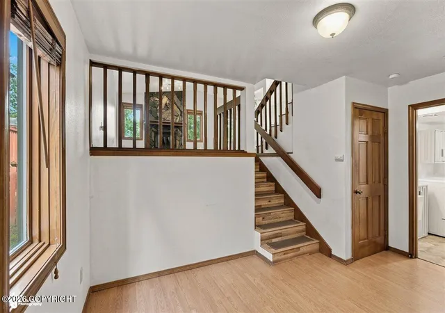 Photo 3 of Single family home for sale at 8019 Country Woods Dr, Anchorage, AK 99502 | MLS# 26-11136 | Listing updated on 2026-09-28