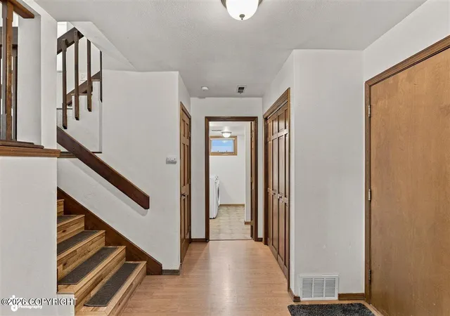 Photo 3 of Single family home for sale at 8019 Country Woods Dr, Anchorage, AK 99502 | MLS# 26-11136 | Listing updated on 2026-09-28