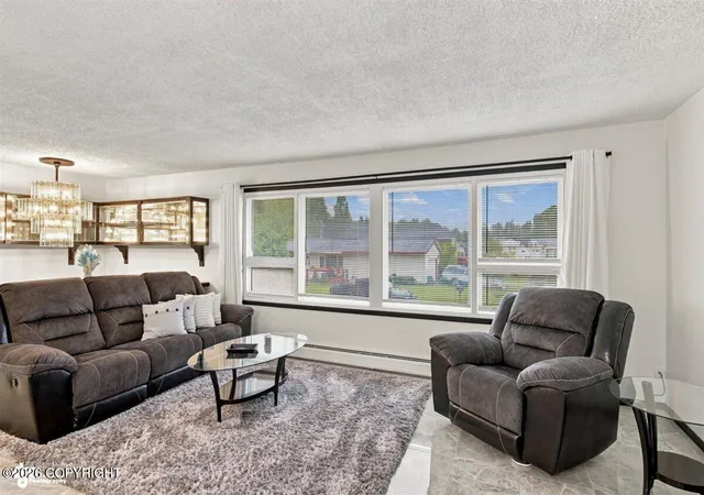 Photo 3 of Single family home for sale at 1480 Cache Dr, Anchorage, AK 99507 | MLS# 26-11163 | Listing updated on 2026-09-06
