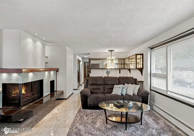 Photo 4 of Single family home for sale at 1480 Cache Dr, Anchorage, AK 99507 | MLS# 26-11163 | Listing updated on 2026-09-06