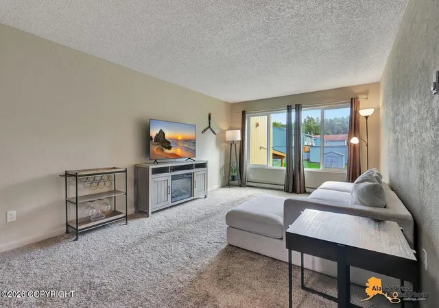 Photo 3 of Condo for sale at 3100 Ward Pl #12, Anchorage, AK 99517 | MLS# 26-12062 | Listing updated on 2026-09-18