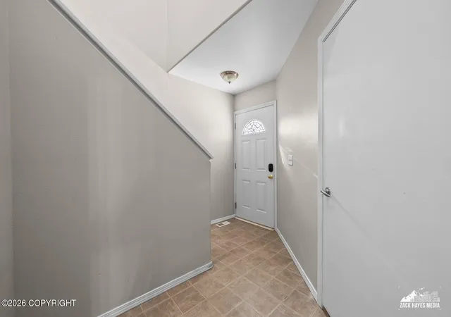 Photo 3 of Sale Pending at 233 Whisper Knoll Cir #B, Anchorage, AK 99504 | MLS# 26-11246 | Listing updated on 2026-09-25