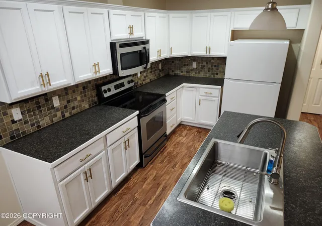 Photo 2 of Condo for sale at 2431 Hillbrook Cir, Anchorage, AK 99504 | MLS# 26-11270 | Listing updated on 2026-09-02