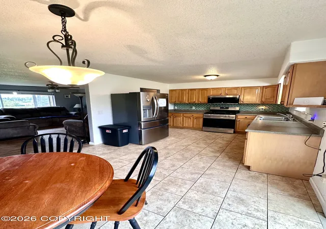 Photo 3 of Sale Pending at 46350 Woodwill Dr, Kenai, AK 99611 | MLS# 26-11294 | Listing updated on 2026-09-17