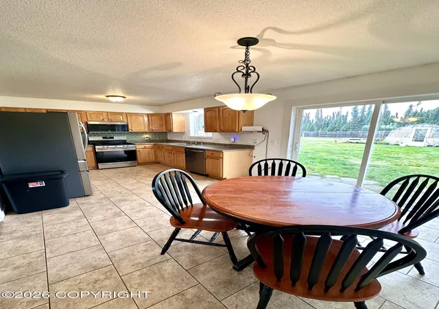 Photo 3 of Sale Pending at 46350 Woodwill Dr, Kenai, AK 99611 | MLS# 26-11294 | Listing updated on 2026-09-17