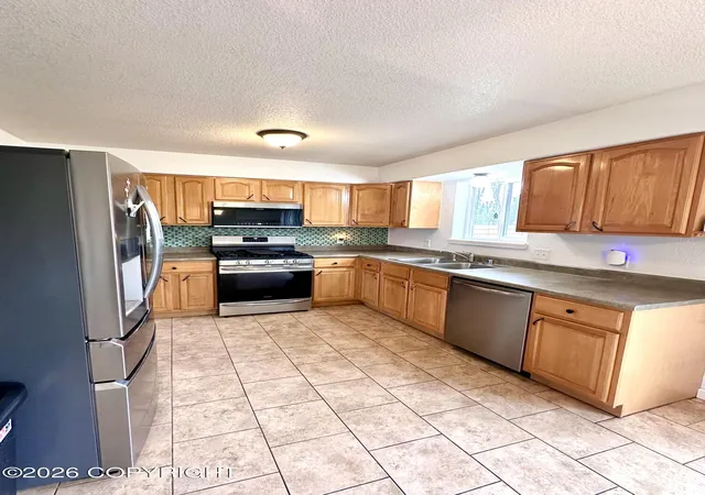 Photo 4 of Sale Pending at 46350 Woodwill Dr, Kenai, AK 99611 | MLS# 26-11294 | Listing updated on 2026-09-17