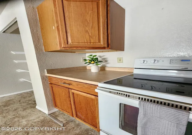 Photo 3 of Sale Pending at 4512 Reka Dr #4512, Anchorage, AK 99508 | MLS# 26-11307 | Listing updated on 2026-09-24