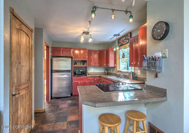 Photo 3 of Sale Pending at 6251 W Tree Dr, Anchorage, AK 99507 | MLS# 26-11829 | Listing updated on 2026-10-05