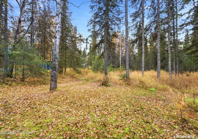 Photo 3 of Sale Pending at 10020 Lone Tree Dr, Anchorage, AK 99507 | MLS# 26-13022 | Listing updated on 2026-10-22